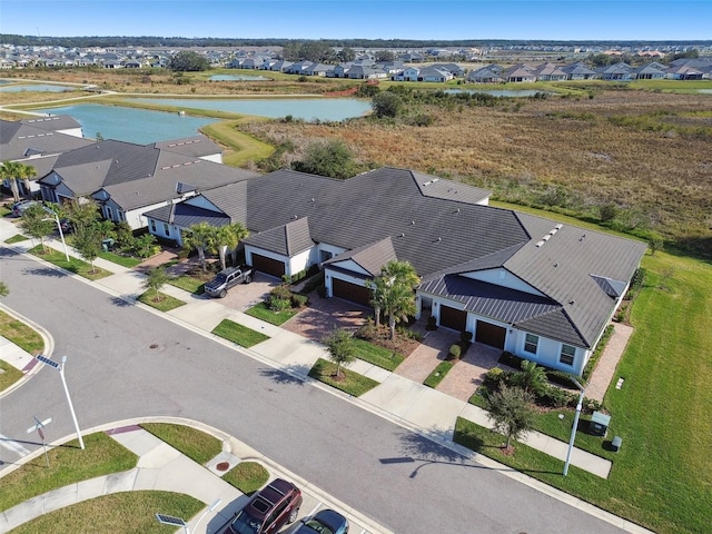 aerial view featuring a water view