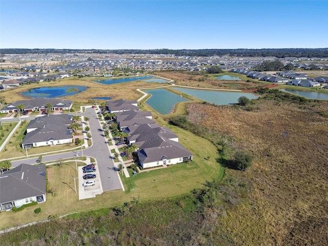 drone / aerial view with a water view