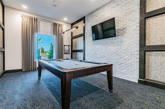 game room featuring brick wall and pool table