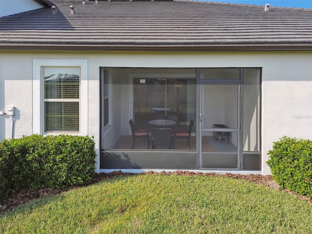 10374 Echo Dock Loop, San Antonio, FL 33576 - exterior view of stucco siding and a tile roof
