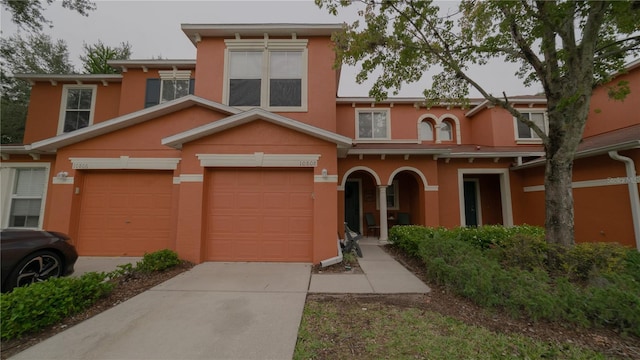 view of front of property with a garage