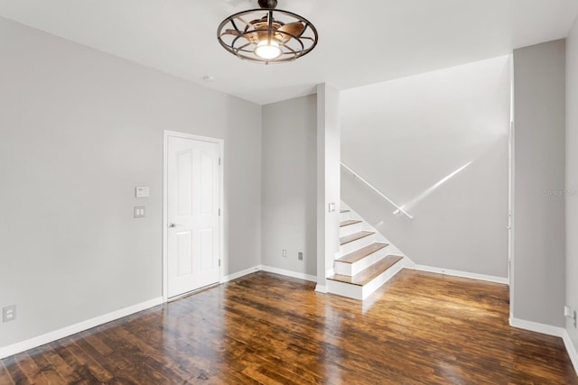 entrance foyer with ceiling fan and dark hardwood / wood-style floors