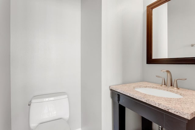 bathroom with toilet and sink