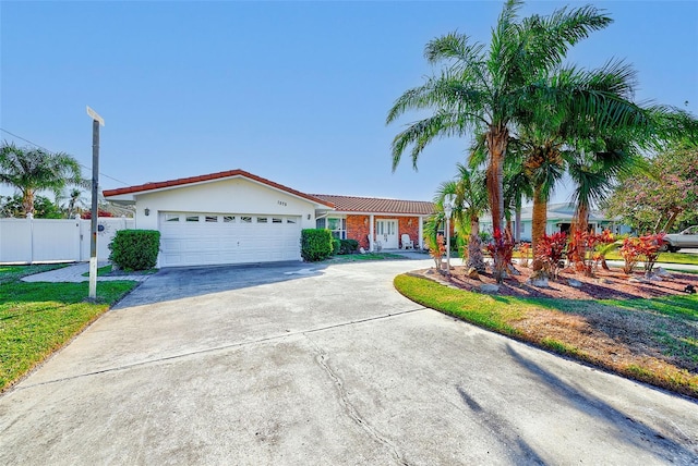 ranch-style home with a garage