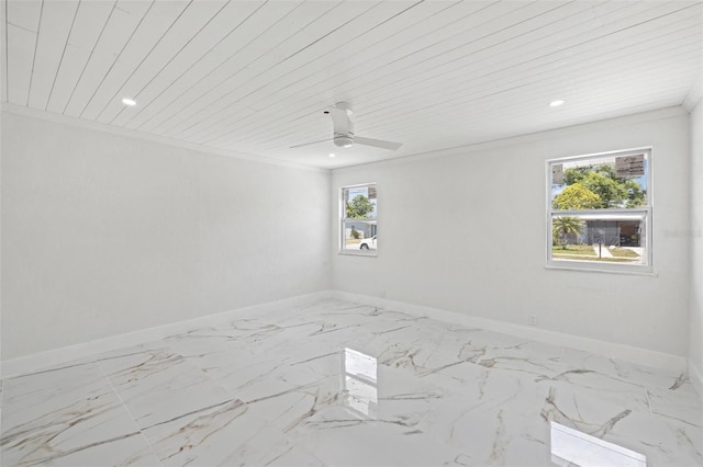 empty room featuring ceiling fan, crown molding, and wood ceiling