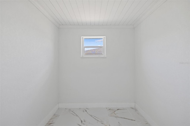 spare room with wooden ceiling and ornamental molding