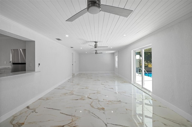 spare room featuring ceiling fan, crown molding, and wooden ceiling