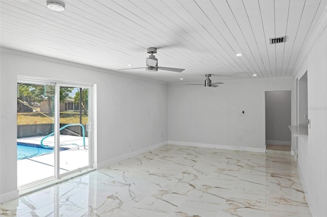 spare room featuring ceiling fan and wood ceiling