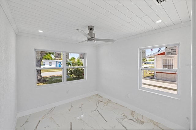 empty room with ceiling fan, ornamental molding, and wood ceiling