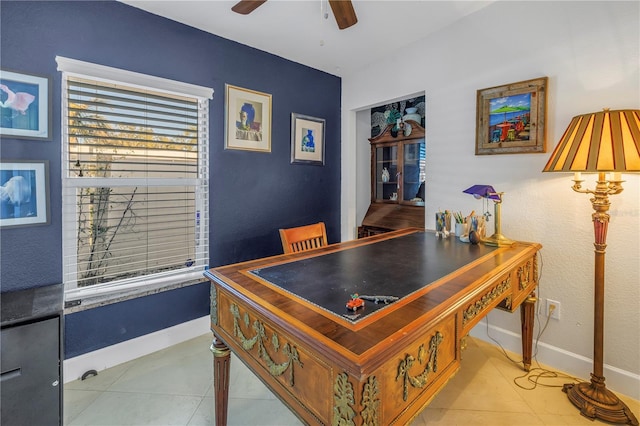 tiled home office with ceiling fan