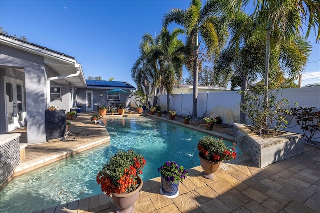 view of pool with a patio area