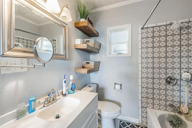 full bathroom with tiled shower / bath combo, crown molding, vanity, and toilet