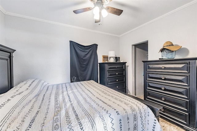 carpeted bedroom featuring crown molding and ceiling fan