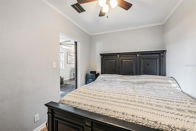 bedroom featuring crown molding and ceiling fan