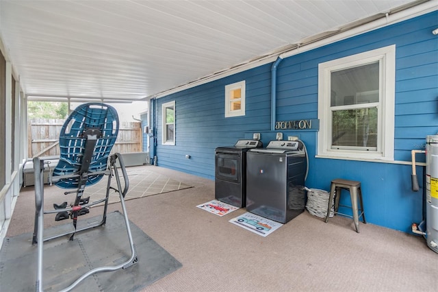 exterior space with washing machine and clothes dryer