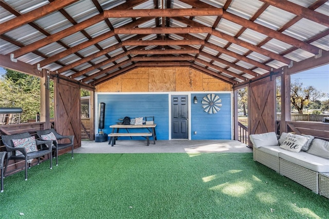 exterior space with a yard and an outdoor hangout area