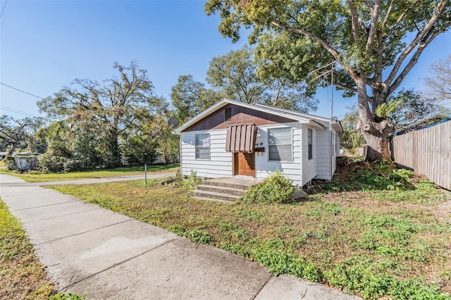 exterior space featuring a front lawn