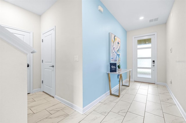 601 Drop Shot Dr, Davenport, FL 33896 - entrance foyer featuring light marble finish flooring and recessed lighting
