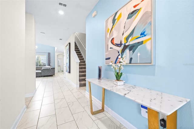 601 Drop Shot Dr, Davenport, FL 33896 - hall featuring stairs, light marble finish flooring, and recessed lighting
