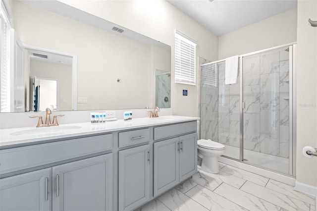 601 Drop Shot Dr, Davenport, FL 33896 - bathroom with marble finish flooring, a marble finish shower, and double vanity