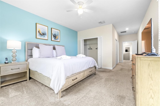 bedroom with light colored carpet and ceiling fan