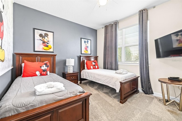 601 Drop Shot Dr, Davenport, FL 33896 - bedroom featuring light carpet and ceiling fan
