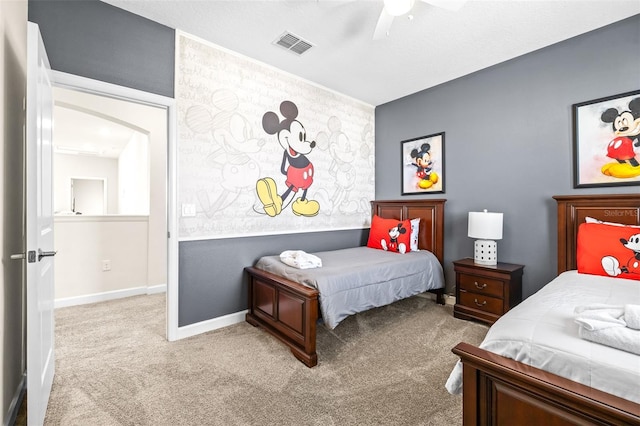 bedroom with light carpet and ceiling fan