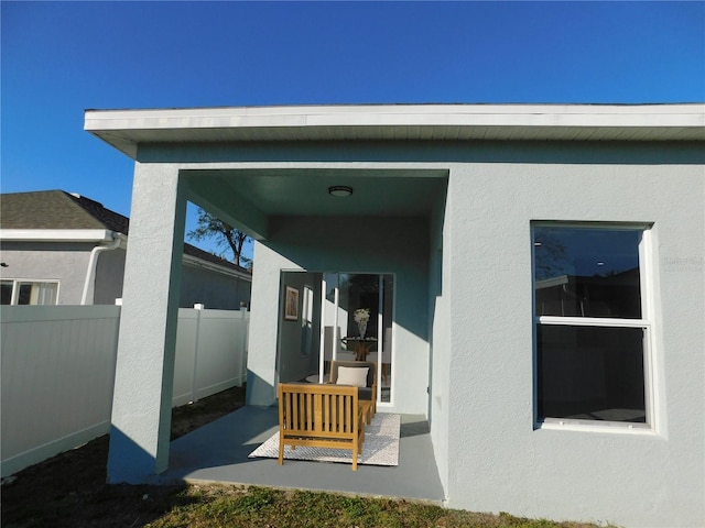 exterior space with outdoor lounge area and a patio