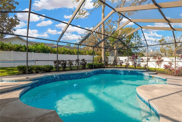 view of pool featuring a lanai and a patio area