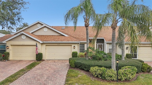 single story home with a garage