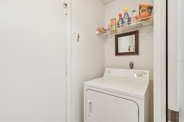 clothes washing area with washer / clothes dryer