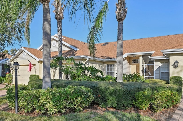 view of front of home with a garage