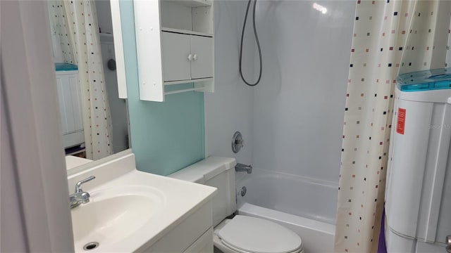 full bathroom featuring toilet, vanity, and shower / bath combo with shower curtain