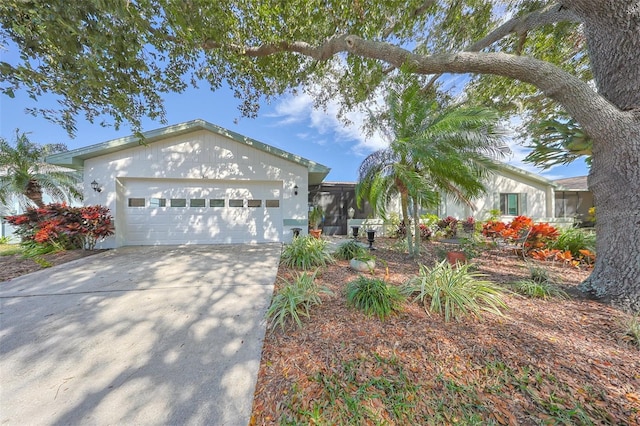 ranch-style house featuring a garage