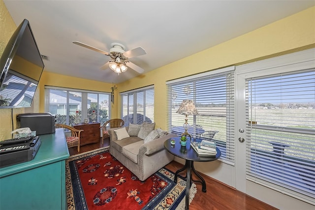 interior space featuring ceiling fan