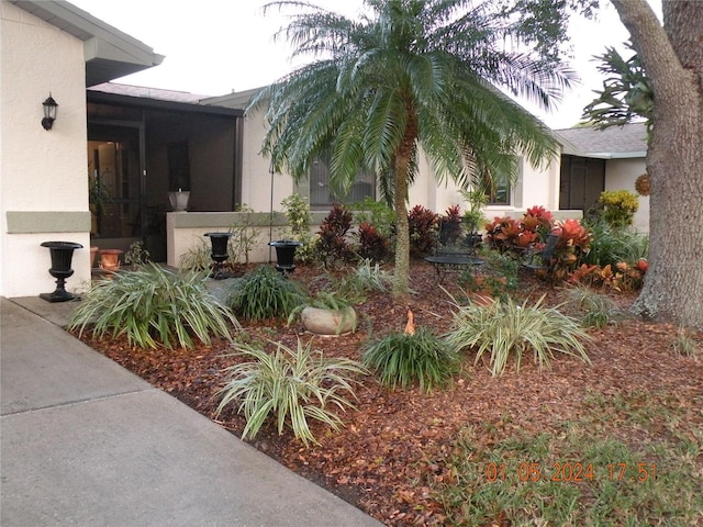 1318 Leland Dr, Sun City Center, FL 33573 - view of side of property featuring stucco siding