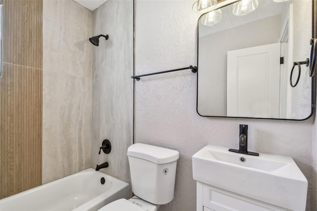 full bathroom with toilet, vanity, and washtub / shower combination