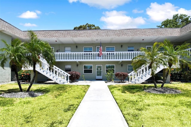 view of building exterior featuring stairs