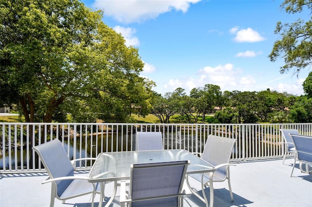 view of patio featuring a water view