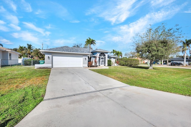 ranch-style home with a garage and a front yard