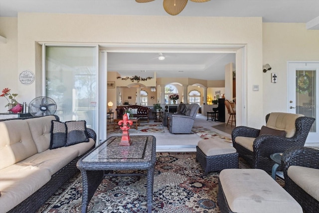 living room featuring ceiling fan