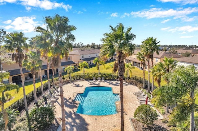 view of swimming pool with a patio area