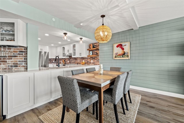 dining space with dark hardwood / wood-style floors