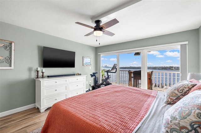 bedroom with ceiling fan, access to exterior, and light wood-type flooring