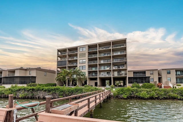 outdoor building at dusk with a water view