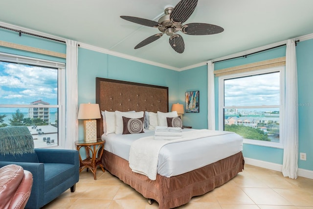 tiled bedroom featuring crown molding and ceiling fan