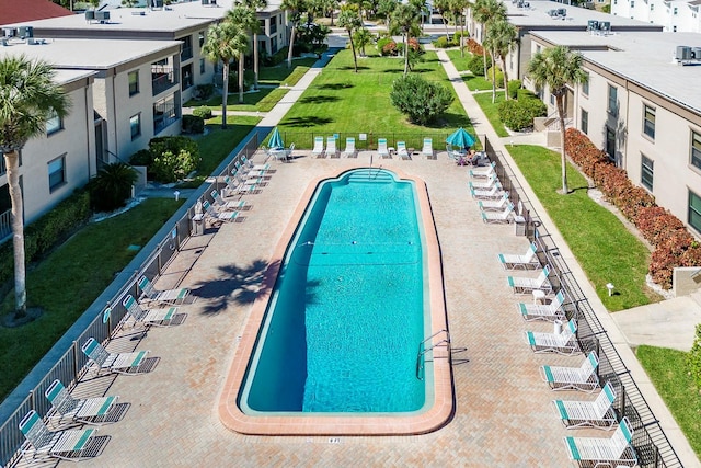 view of swimming pool with a patio area