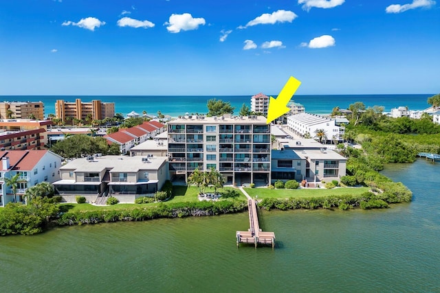 birds eye view of property featuring a water view