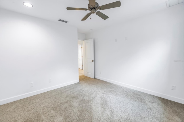 empty room with carpet floors and ceiling fan