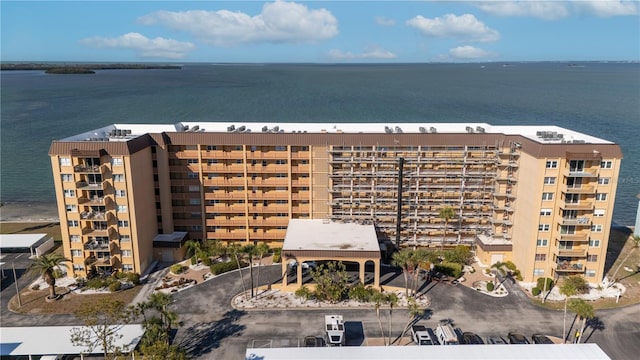 view of building exterior with a water view